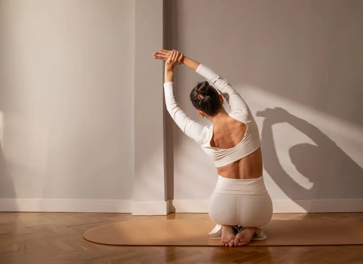 A woman doing a Pilates exercise